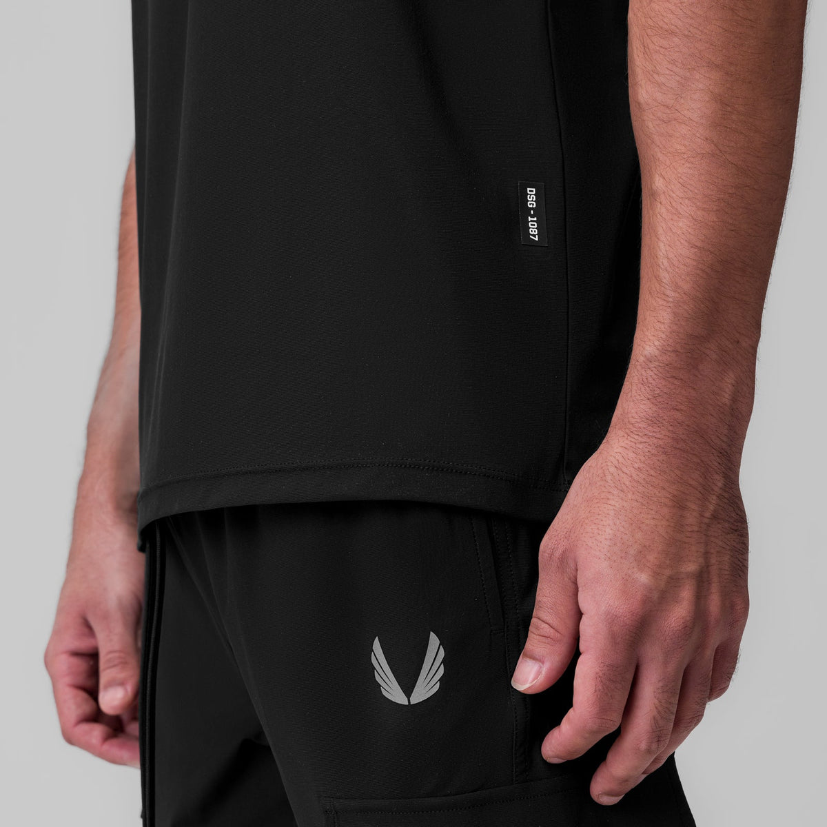 1087. Tetra-Lite® Ice Zip Tee - Black | ASRV