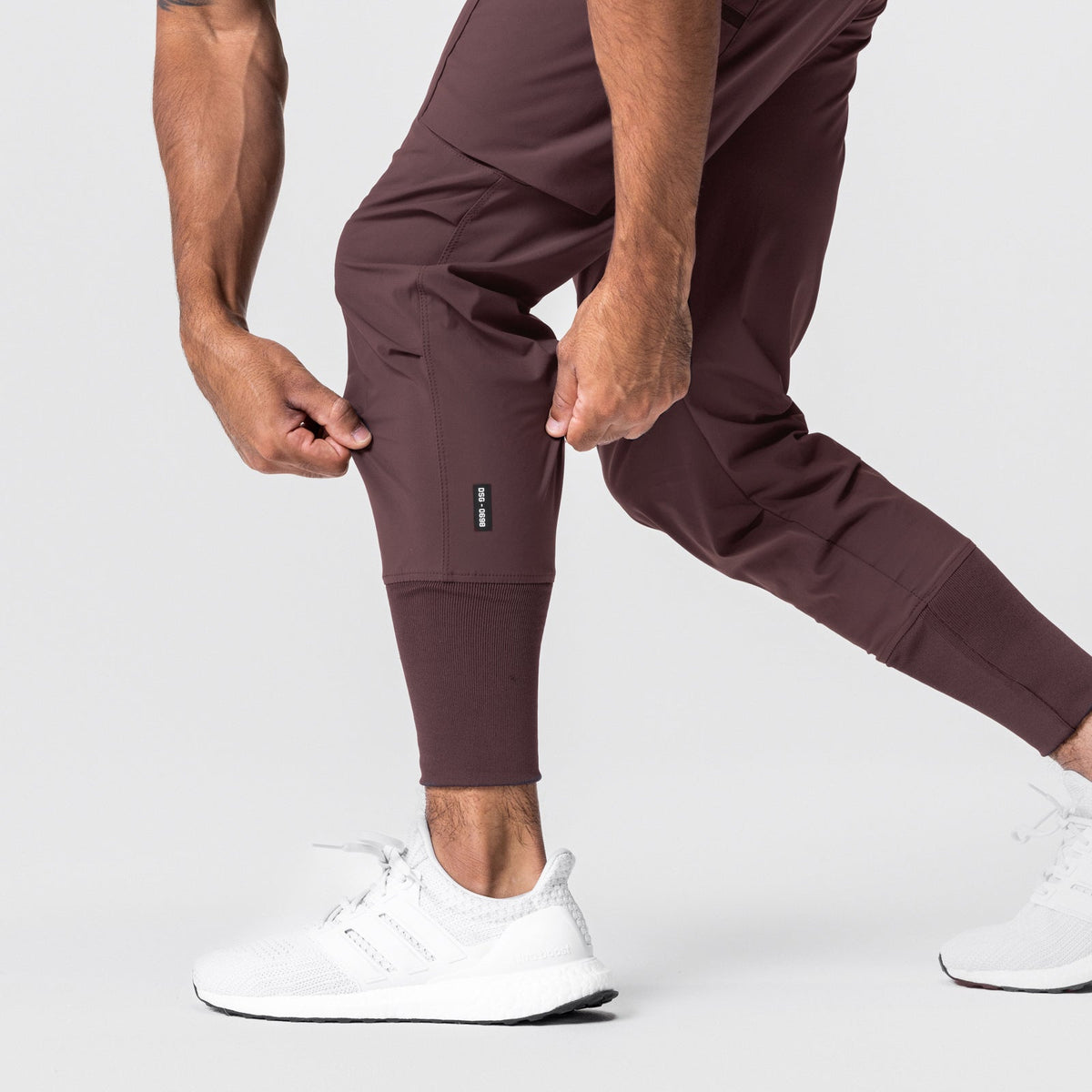 0698. Tetra-Lite® Inlay Pocket High Rib Jogger - Plum | ASRV