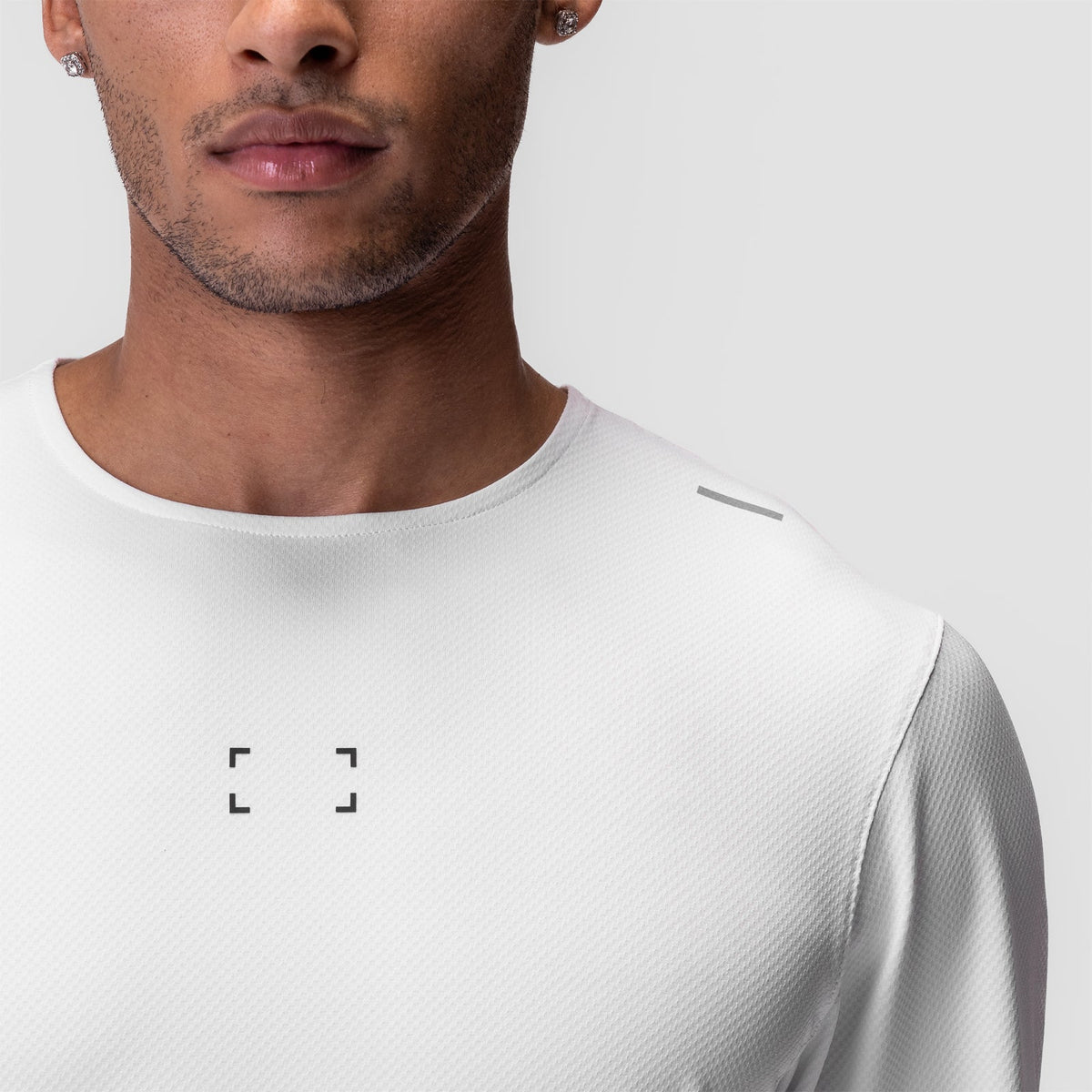 0907. AeroSilver® Training Long Sleeve - White "Space Bracket" | ASRV