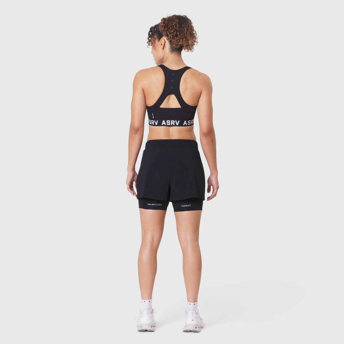 W083. LYCRA® ADAPTIV Racerback Sports Bra - Black | ASRV