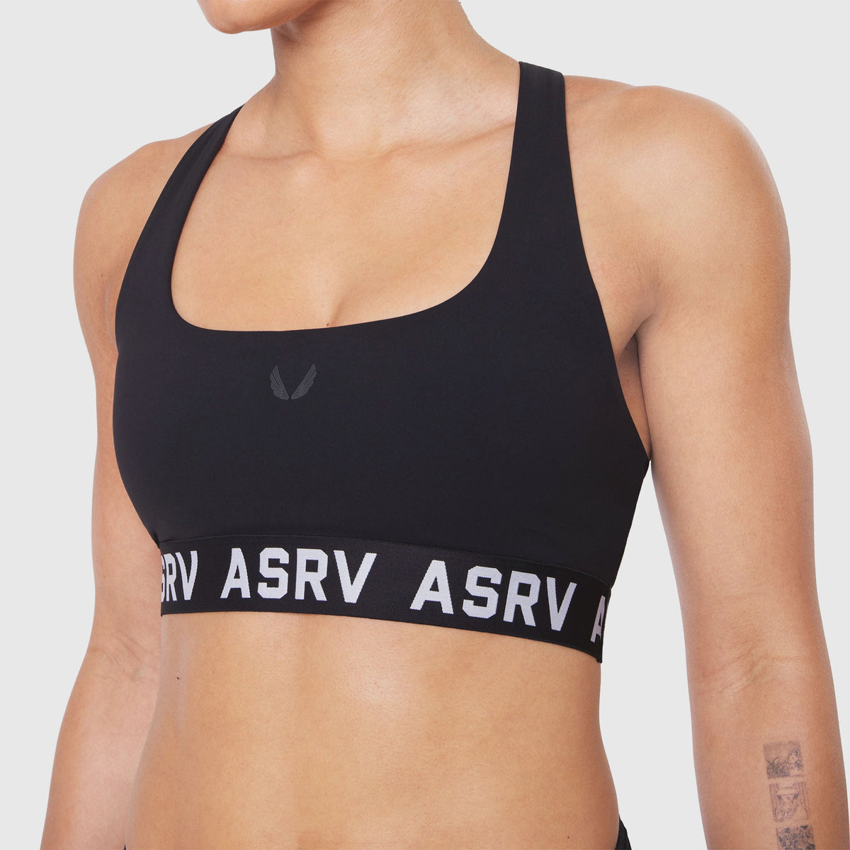 W083. LYCRA® ADAPTIV Racerback Sports Bra - Black | ASRV