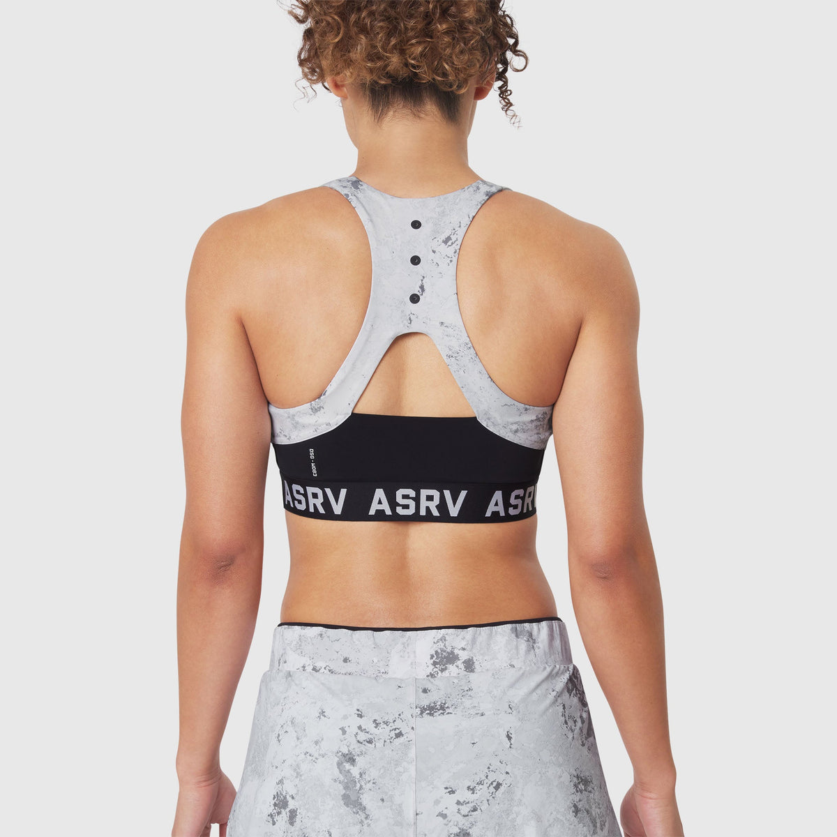 W083. LYCRA® ADAPTIV Racerback Sports Bra - Sedona Snow Camo | ASRV