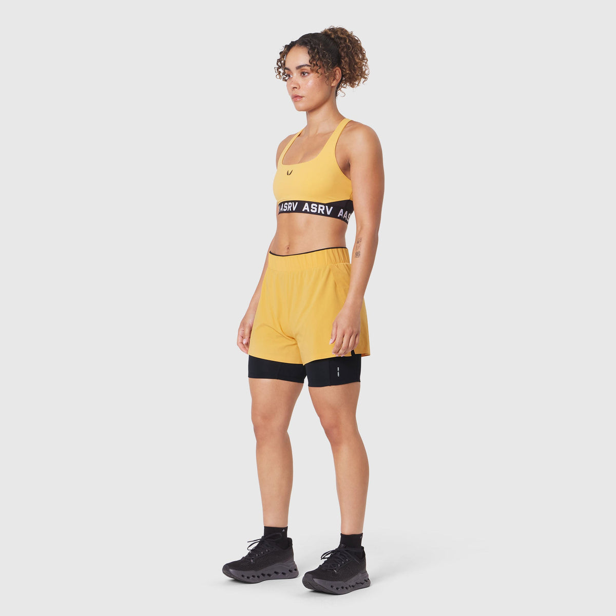 W083. LYCRA® ADAPTIV Racerback Sports Bra - Amber | ASRV