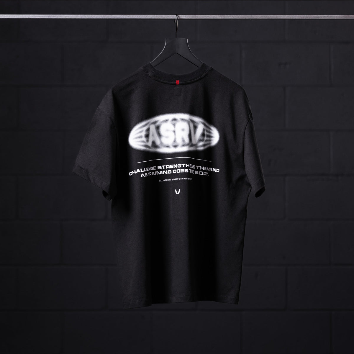 0797. Tech Essential™ Relaxed Tee - Black "Global Reach" | ASRV