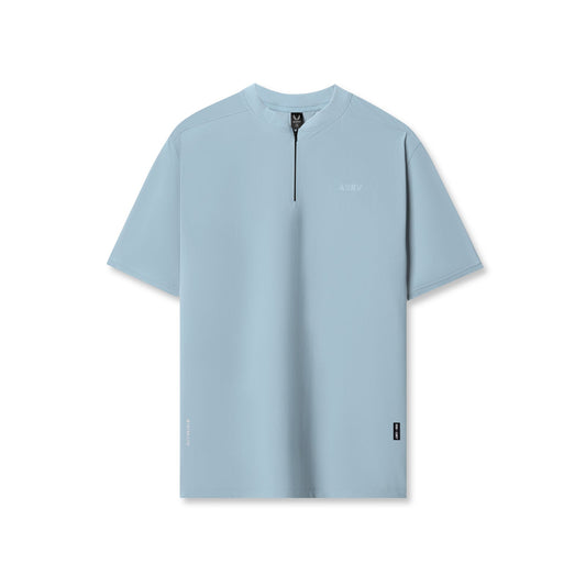 1087. Tetra-Lite® Ice Zip Tee - Light Sky | ASRV