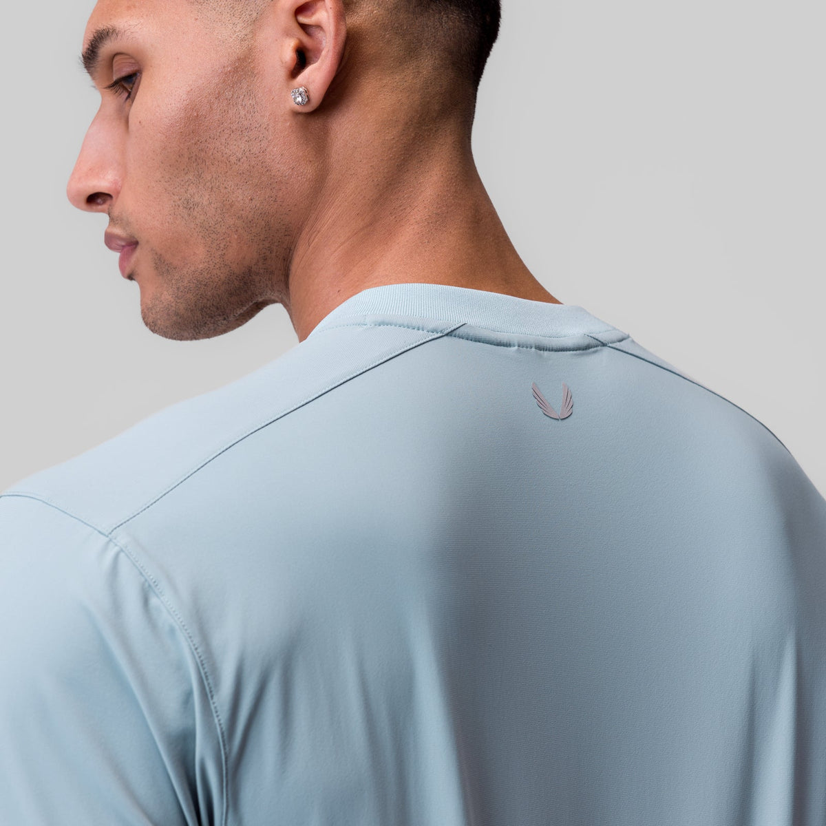 1087. Tetra-Lite® Ice Zip Tee - Light Sky | ASRV