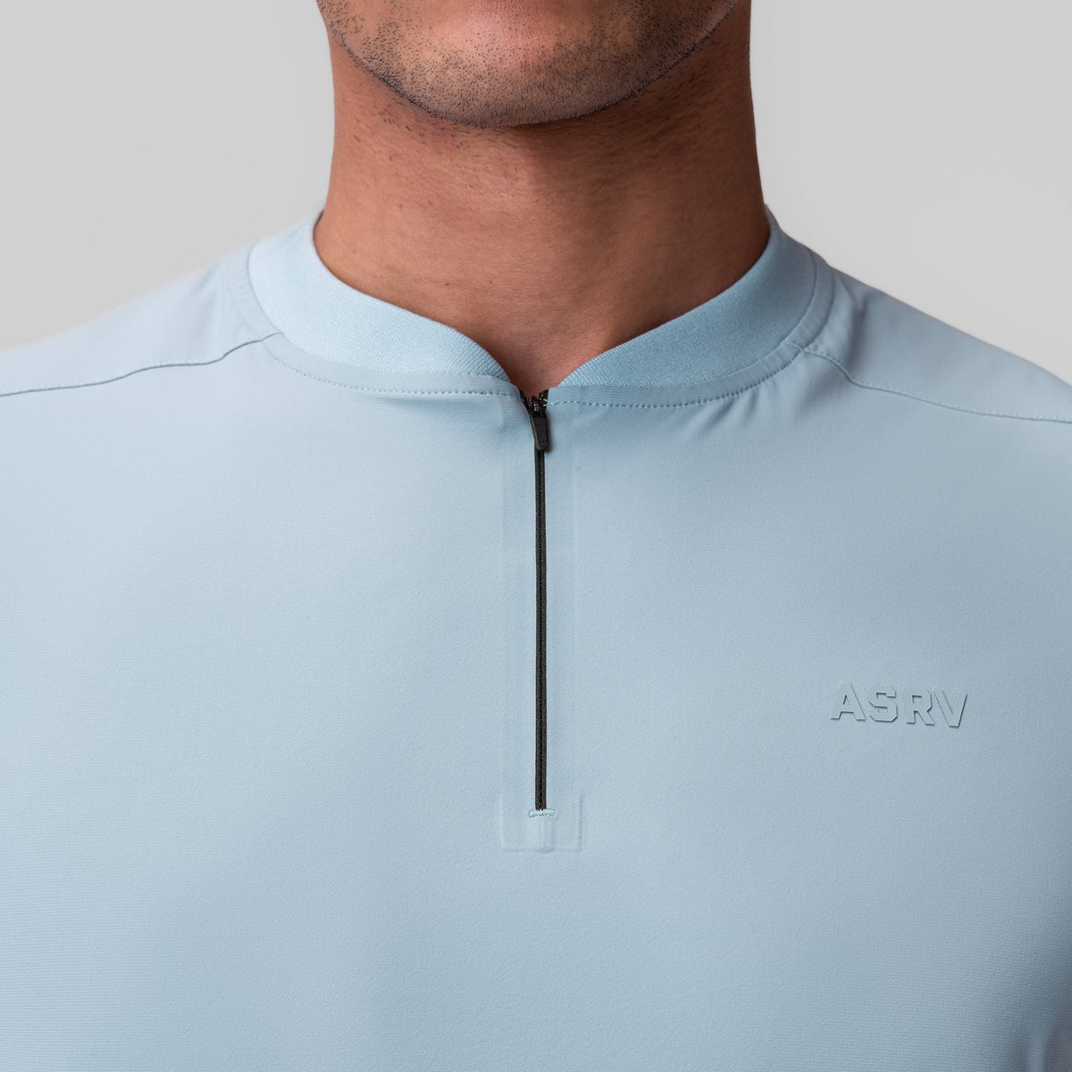 1087. Tetra-Lite® Ice Zip Tee - Light Sky | ASRV