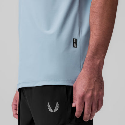 1087. Tetra-Lite® Ice Zip Tee - Light Sky | ASRV