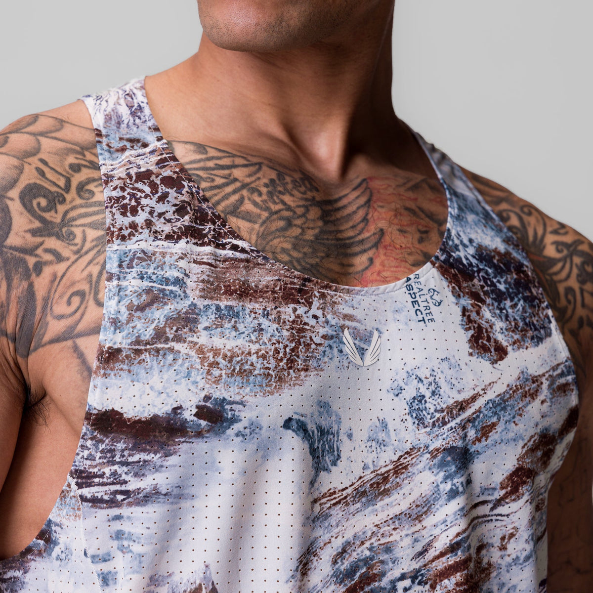 0949. Laser-Vent™ Singlet Tank - Realtree® Aspect | ASRV