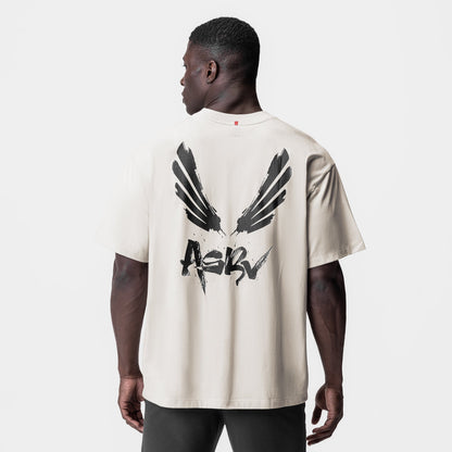 0797. Tech Essential™ Relaxed Tee - Stone "Brush Wings/ASRV" | ASRV