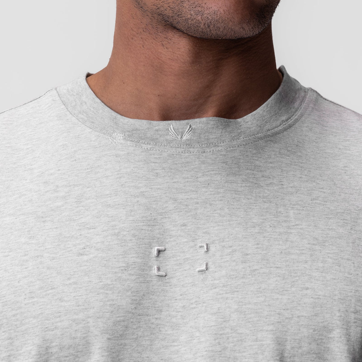 0797. Tech Essential™ Relaxed Tee - Heather Grey "Space Bracket" | ASRV