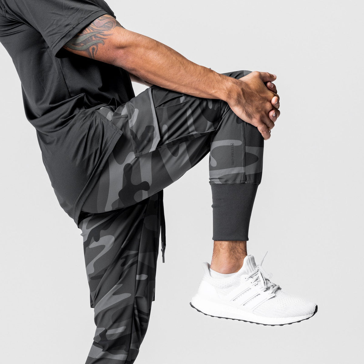 0437. Tetra-Lite® Cargo High Rib Jogger - Black Camo | ASRV