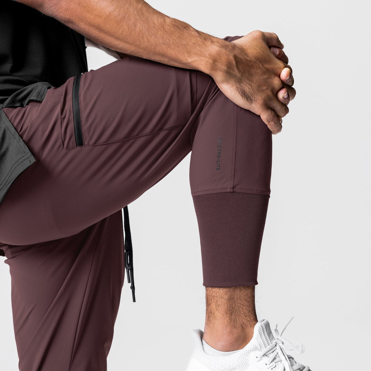 0698. Tetra-Lite® Inlay Pocket High Rib Jogger - Plum | ASRV